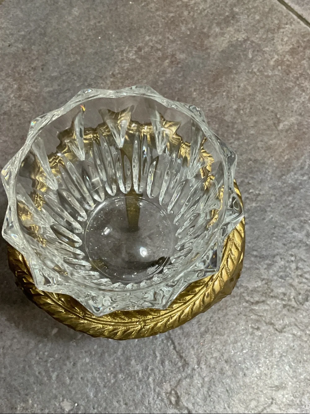 Brass candle holder with glass